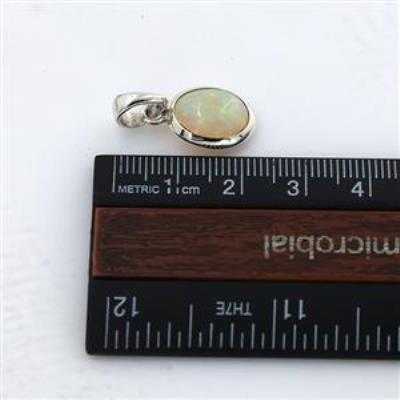 Oval Ethiopian Opal Pendant in 925 Sterling Silver – Fine Jewelry Elegance | Akrati Jewels Inc