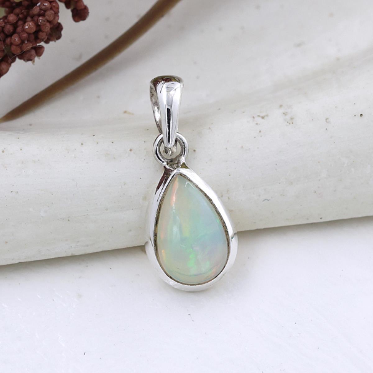 Elegant Teardrop Ethiopian Opal Pendant in 925 Sterling Silver | Akrati Jewels Inc